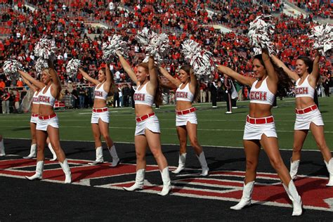 college football world reacts to cheerleader flirting video the spun