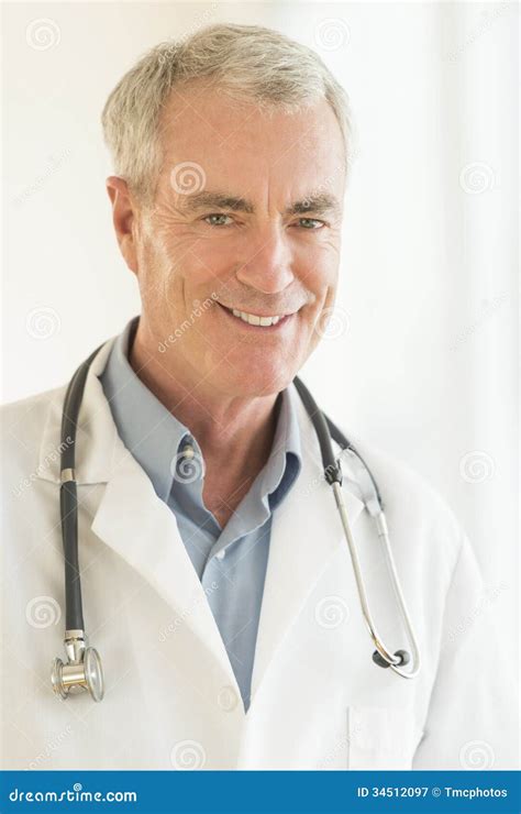 Doctor With Stethoscope Around Neck In Clinic Stock Image Image Of
