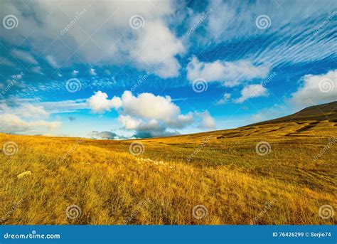 Amazing Cloudscape Above The Mountain Meadow Stock Image Image Of