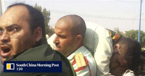 militants launch deadly attack on iranian army parade victims include revolutionary guards