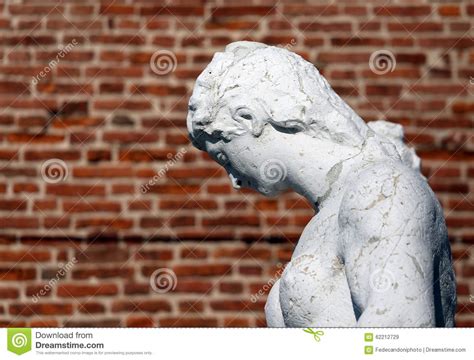 Female Statue With The Background Brick Wall Stock Image Image Of
