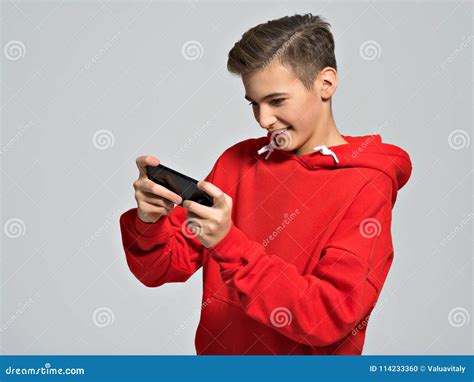 Teenager Playing Games On Smartphone Stock Photo Image Of Play Enjoy