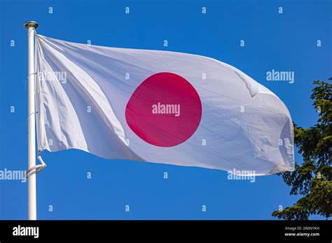 National Flag Of Japan Nisshoki At Blue Sky Stock Photo Alamy