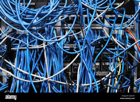 Chaotic Mess Of Network Cables All Tangled Together Stock Photo Alamy
