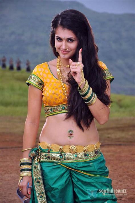 The viewers do not consider a movie complete without a female lead actor. tapsee-hot-saree-navel-photos-9 - South Indian Cinema Magazine