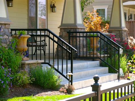Decorative concrete stairs offer endless design possibilities for creating a grand front entrance absence of handrails accounts for a large percentage of falls on stairways, according to cornell. Handrail Flanged to Concrete by Arbor Fence, Inc. | Porch handrails, Arbor, Handrail
