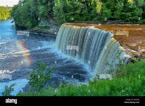 Upper Tahquamenon Falls In Summer As Sunset Approaches In Michigans