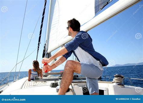 Skipper Navigating The Sailing Boat Woman Relaxing Stock Photo Image