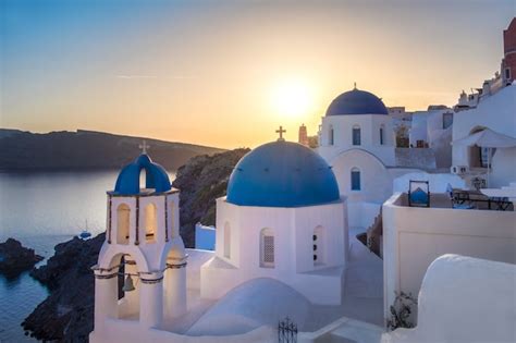 Premium Photo Sunset Over Local Church In Oia Santorini Greece