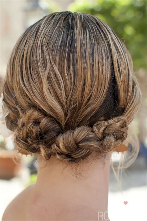 This is a very royal updo, so be the queen that you are and stun with this swooping braid that hugs the outside of the head. Braided Twist & Pin mini bun hairstyle tutorial, on ...