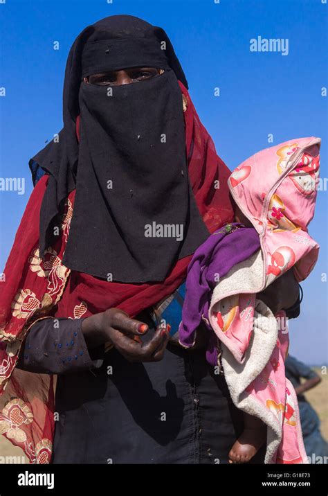 Ethiopian Oromo Mother With Her Baby Dressed In Burqa Amhara Region
