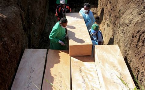 First Mass Covid Burial Held In Papua New Guinea As Morgues Overflow