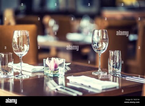 Luxury Table With Glasses Napkins And Cutlery In Restaurant Or Hotel