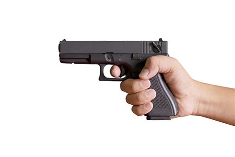 Holding Gun Up Stock Photos Pictures And Royalty Free Images Istock