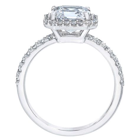 Costco's engagement ring retails for $10,999.99 and features the following specifications: 2.94ctw Square Emerald Cut Diamond Halo Ring, Platinum | Costco UK
