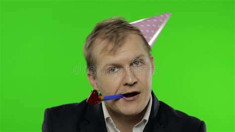 Drunk Sleepy Businessman In Festive Cap Blowing A Whistle Hangover Chroma Key Stock Video