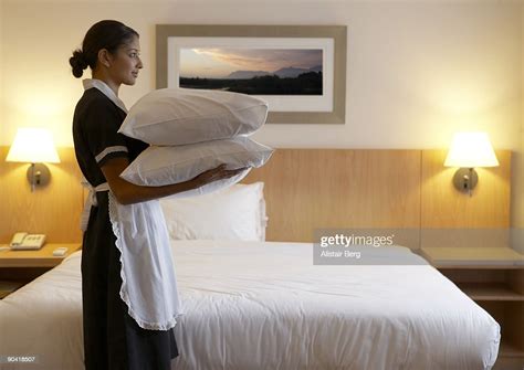 Chamber Maid In Hotel Room High Res Stock Photo Getty Images