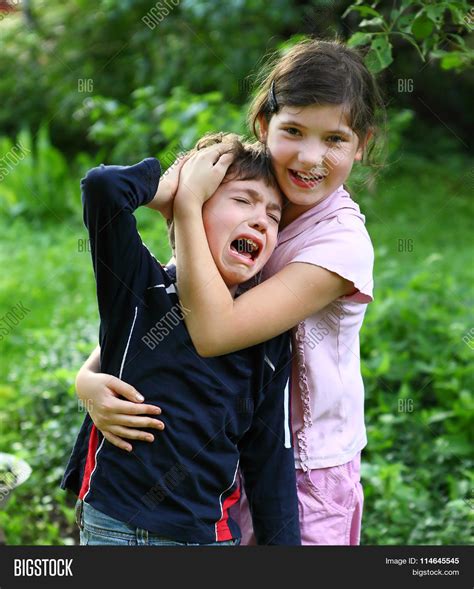 Girl Comforting Hugging Crying Image And Photo Bigstock