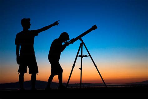 Royalty Free Person Looking Through Telescope Pictures Images And