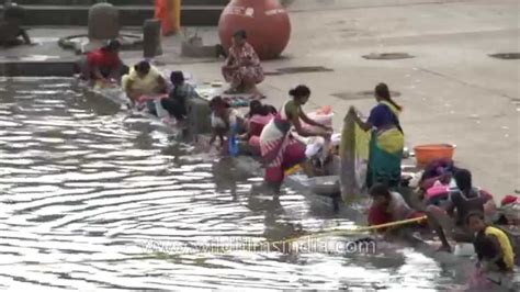 Women Devotees Wash Their Clothes At Ramkund Nashik Kumbh Youtube