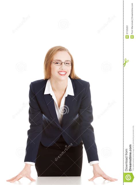 Beautiful Business Woman Bending Over Table Stock Image