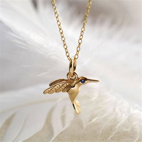Nine Carat Gold Hummingbird Necklace With Sapphire Gold Hummingbird