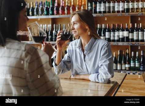 Young Women Drinking Red Wine Stock Photo Alamy