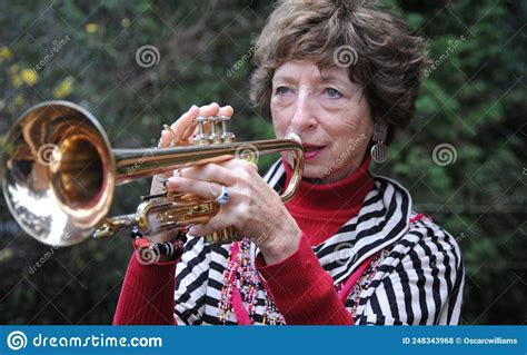 Mature Female Trumpet Player Stock Photo Image Of Brass Sounds