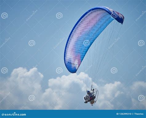 Powered Paraglide Or Paramotor Against Blue Sky Paragliding Editorial