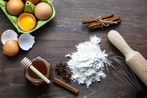 Ingredients For Baking Flour Eggs Rolling Pin On A Wooden Background