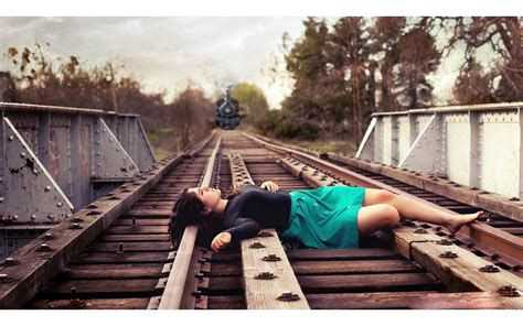 Woman Infant Lay On Tracks To Die A Train Passes Over Them But