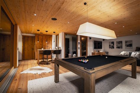 And if you're tired of the pool, hit the beach which is just metres away on. The private games room of the luxurious ski chalet called ...