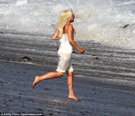 Lady Gaga Bares Her Braless Assets On Very Risqu Beach Shoot Daily Mail Online