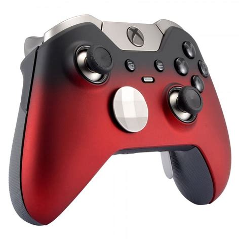A Close Up Of A Red And Black Controller