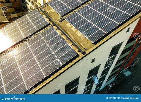 Aerial View Of Solar Photovoltaic Panels On A Roof Top Of Residential