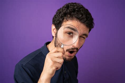 Man Looking Through Magnifying Glass Stock Photo Download Image Now