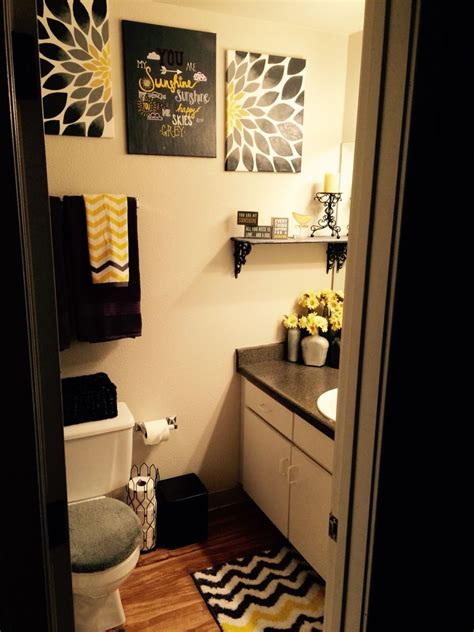 Turns out some of the best looking bathroom decor items are diys. Yellow, grey, and black "You Are My Sunshine" theme ...