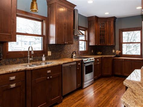 Kitchen wall paint color ideas with brown cabinets. Spacious Gray-Blue Transitional Kitchen | HGTV