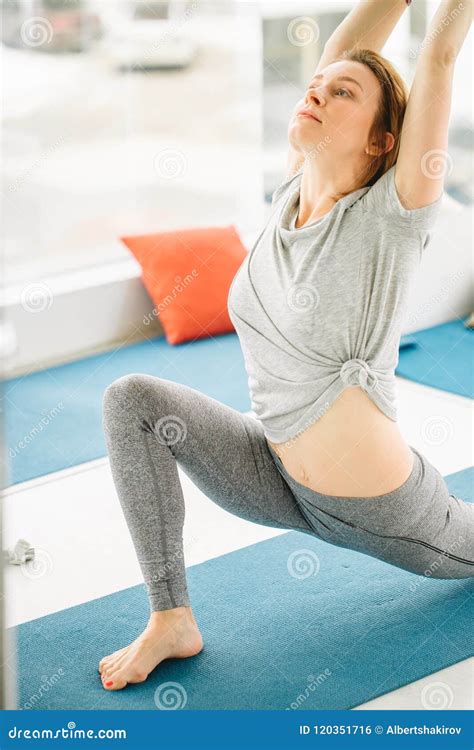 Beautiful Sporty Fit Yogini Woman Practices Yoga Asana Virabhadrasana