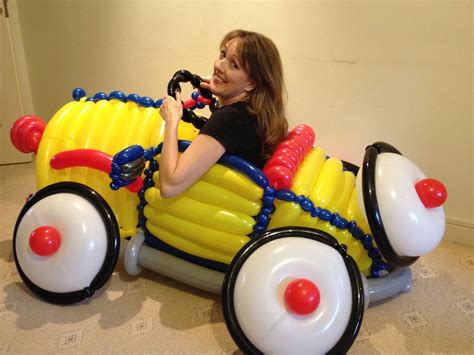 Tobi Mcjunkin Posing In Balloon Car Made By Mr Balloonatic For Birthday Party With Clown Car