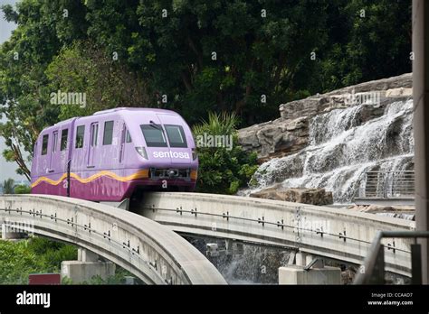 The Sentosa Express Monorail Approaches A Station On Sentosa Island In