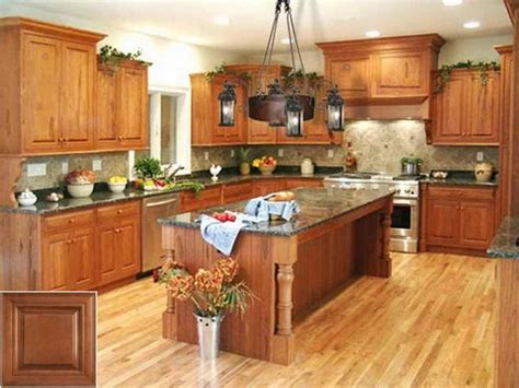 This way the oak cabinetry can gain a beautiful golden glow. A-Z of - oak cabinets sage green walls. #oakkitchencabinets #kitchenisland | Kitchen cabinet ...