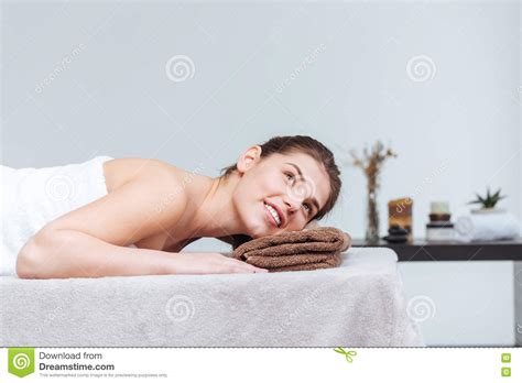 Happy Pretty Young Woman Smiling And Lying In Spa Salon Stock Image Image Of Skincare Healthy