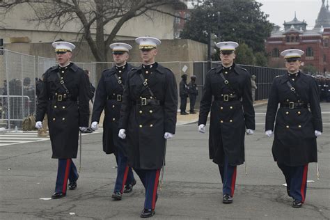 Military Officers Of The United States Marines Form Honor Guard At The
