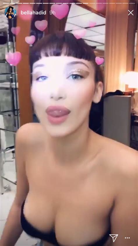 bella hadid s assets almost spill out of plunging semi sheer frock in paris celebrity news
