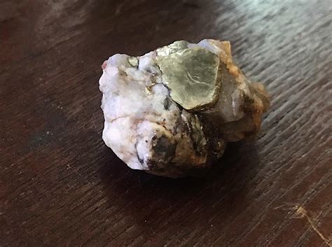 Any Help Identifying The Shiny Silvery Chunk On Top Of This Rock Would