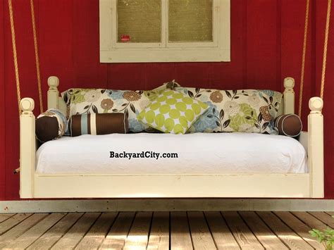 A swing bed has an elongated sitting area that can accommodate several people and is often supported on the sides by chains or strong ropes. Original Swing Bed - OriginalSwingBed