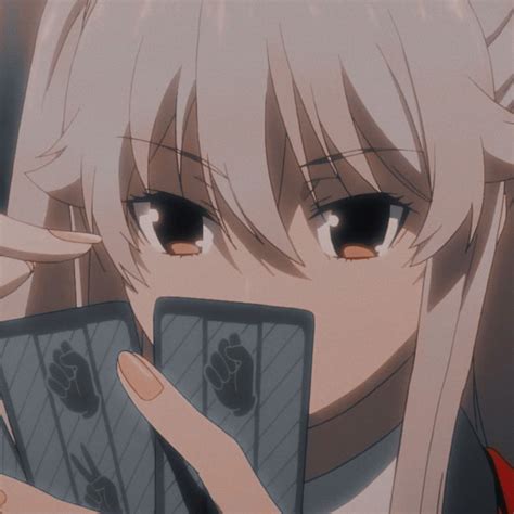 An Anime Character Holding Two Cell Phones In Her Hand And Looking At