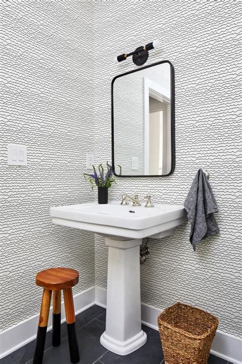 Shares A Bright Powder Room That Features Modern Wallpaper A