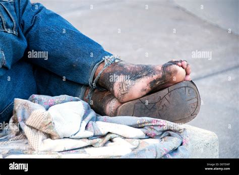 Homeless Man Sleeping On Bench Stock Photo Alamy